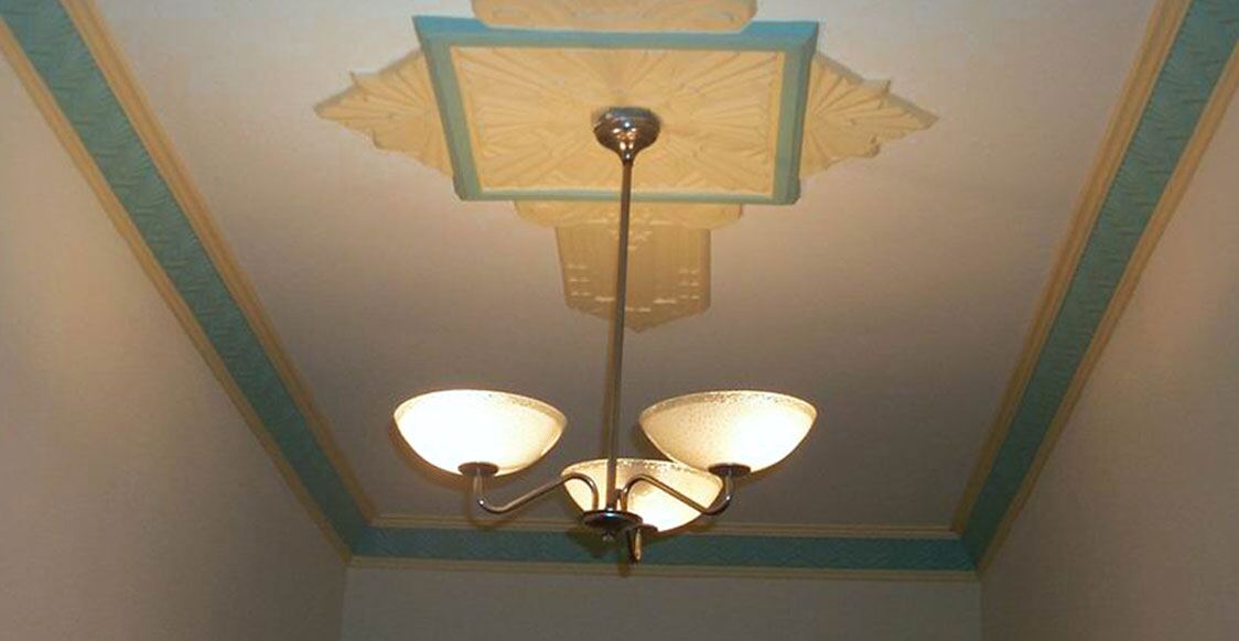 Feature ceiling and rose picked out in a contrast colour by Heathurst Coatings